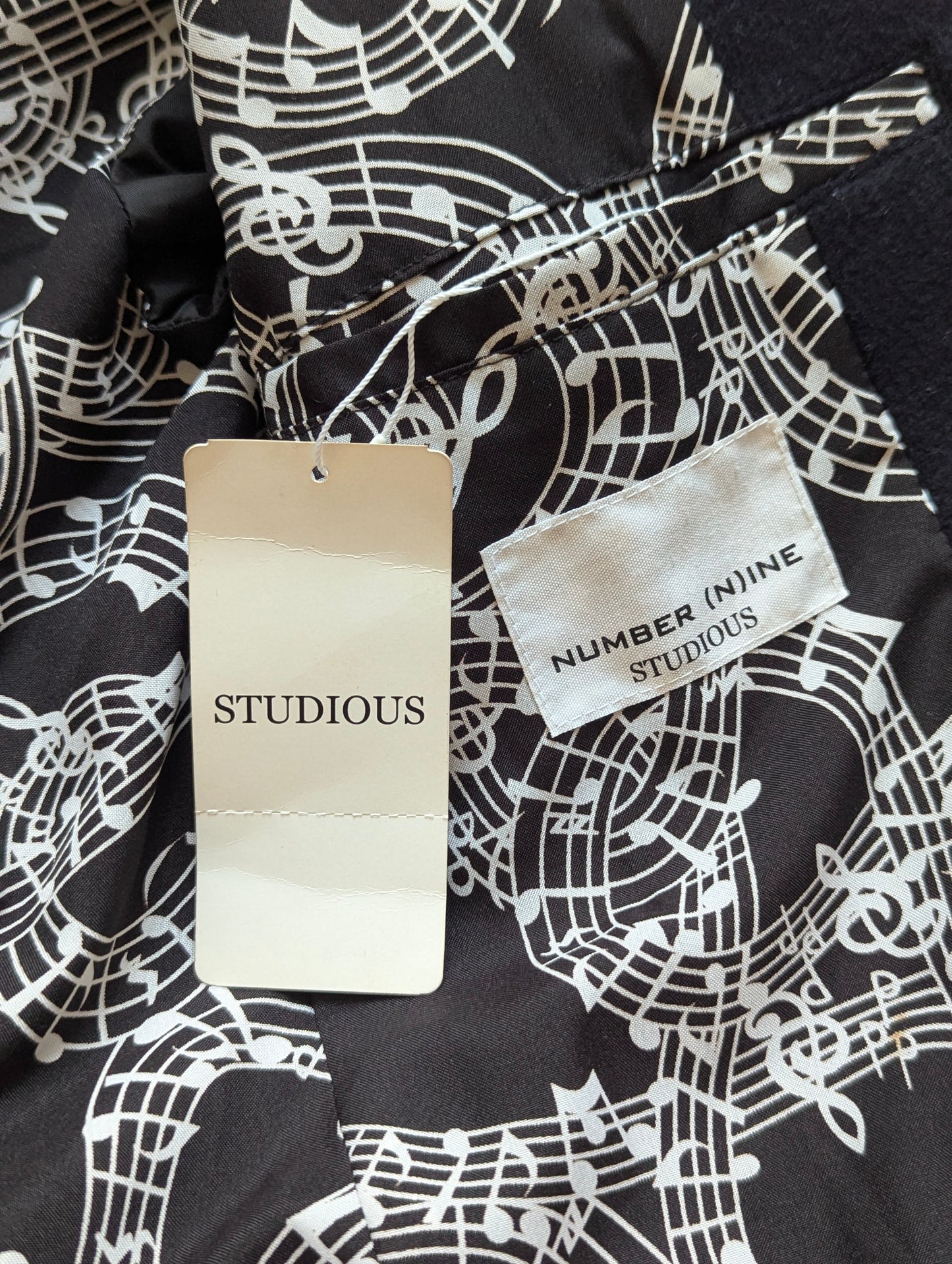 Number (N)ine musical note reprint coat