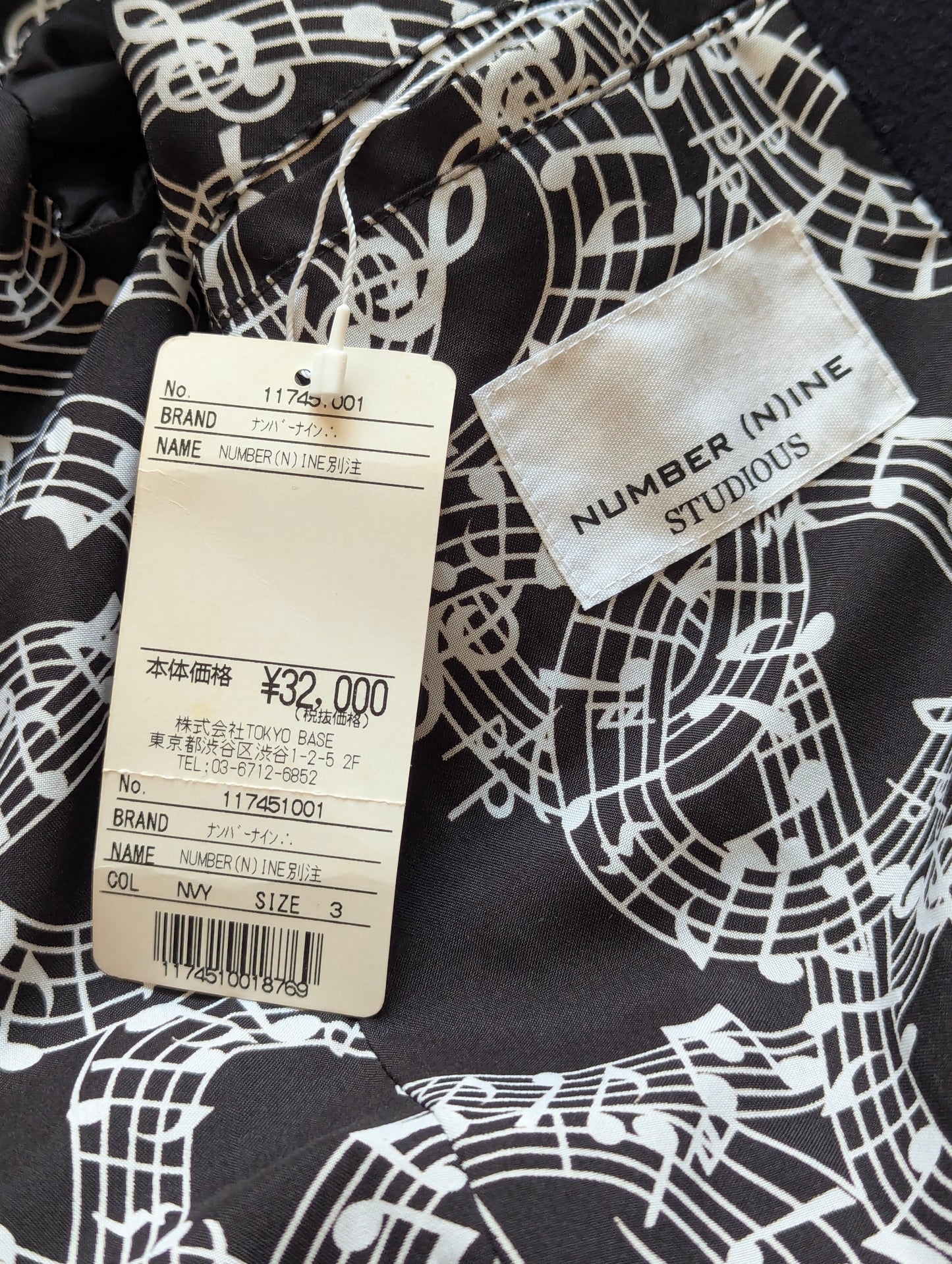 Number (N)ine musical note reprint coat